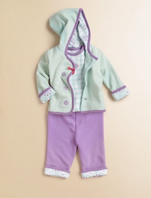 An essential three-piece set includes a crystal-embroidered hoodie and sweatpants with crystal lining, plus a polka dot bodysuit for an ultra-soft