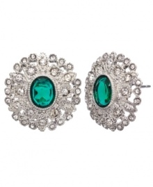 Green party. You'll look festive and fashionable in Monet's button stud earrings. Featuring emerald-hued resin as well as glittering crystals and glass accents, they're made in silver tone mixed metal. Approximate diameter: 3/4 inch.