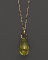 A faceted teardrop of verde, set in 14 Kt. yellow gold.