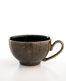 More than meets the eye, Denby's Praline teacup boasts standout durability in addition to style. With a distinct silhouette in casual stoneware and unique speckled glaze.