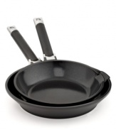 Give it a fry-this cast aluminum duo steps up to every task you toss its way with a heavy-duty nonstick ceramic coating that releases food fast and guarantees an eco-friendly PFOA- and PTFE-free approach to the art of cuisine. Each fry pan features a mess-free pour spout that cuts down on splatter. 3-year warranty.