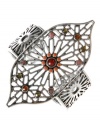 Borrow style inspired by exotic lands. Lucky Brand's Moroccan-themed cuff bracelet incorporates an intricate openwork pattern adorned with epoxy beads in shiny peach and red hues. Crafted in silver tone mixed metal. Approximate diameter: 2-1/2 inches.