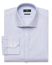 The small alternating stripe pattern of this quality cotton dress shirt pairs well with an assortment of ties, giving your workday wardrobe plenty of versatility.