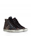 Luxe with a retro edge, these leopard print high-top sneakers from Golden Goose will kick your style into high gear - Round toe, lace up style, side star detail, exposed side-zip closure, stylishly distressed, contrasting rubber sole, back distressed leather stripe - Ankle height - Pair with oversized knits and skinnies, or casual tees and mini-skirts