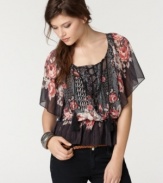 A mixed floral print and tassel tie lace-up detail adds a boho flair to this Bar III chiffon top -- adorable with skinny jeans!