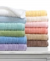 Daily showers become a sumptuous treat with Martha Stewart Collection's Plush tub mat. Featuring ultra-absorbent and fast-drying cotton embellished with a bold, tufted dobby. Choose from a spectrum of cheerful hues.