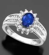 First in its class. This stunning ring features oval-cut sapphire (1 ct. t.w.) and round-cut diamond (1/3 ct. t.w.) set in 14k white gold.