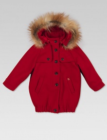 Button-front, wool-blend, felt parka with attached hood, fox fur trim, tone-on-tone GG lining and metal interlocking Gucci detail.Attached hoodLong sleevesFront button placketTwo buttoned storm flapsAngled pocketsElasticized hem70% wool/20% polyamide/10% cashmereDry cleanMade in ItalyFox fur: Finland, Denmark and Canada Please note: Number of buttons may vary depending on size ordered. 