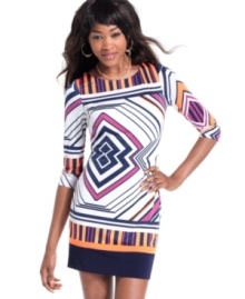 This sheath dress from Baby Phat commands all attention with its colorful geometric print and alluring back cutout.