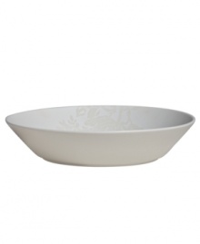 The dual-purpose Bliss cream soup or pasta bowl from Monique Lhuillier for Royal Doulton is made for every day, shaped for modern decor and draped with romantic florals in a soft, muted palette.