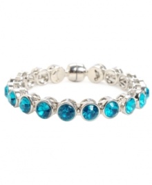 A sparkling style that will snap effortlessly into place. Set in silver tone mixed metal, Haskell's faceted blue zirconia bracelet is secured with a magnetic clasp. Approximate diameter: 2-1/2 inches.