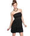 Feathery ruffles give movement to this strapless party dress from Roberta! Style it with fun accessories and dance the night away!