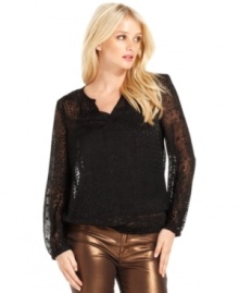 Calvin Klein Jeans offers an ethereal look with this semi-sheer burnout peasant top. Pair it with metallic jeggings for a look high in contrast and style.