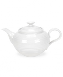 From celebrated chef and writer, Sophie Conran, comes incredibly durable dinnerware for every step of the meal, from oven to table. A ribbed texture gives this white teapot the charming look of traditional hand thrown pottery.