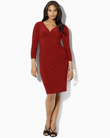 Shirring at one side creates a sleek, flattering silhouette on a dress that's rendered in smooth matte jersey for a look of smart sophistication.