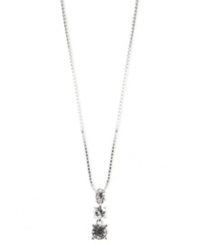 The sophistication of sparkle. A trio of round-cut glass accents are strung lovingly from a silver tone chain on this Anne Klein necklace. Crafted in silver tone mixed metal. Approximate length: 16 inches + 2-inch extender. Approximate drop: 1 inch.