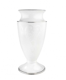 A beautiful porcelain vase with a light detailed design and platinum trim, perfect for all your floral arrangements and striking enough to stand regally all on its own. Qualifies for Rebate