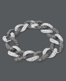 Links of luxury. Overlapping circles adorned with glittering marcasite and sparkling crystals create a luminous look on Genevieve & Grace's glamorous bracelet. Set in sterling silver. Approximate length: 7-1/4 inches.