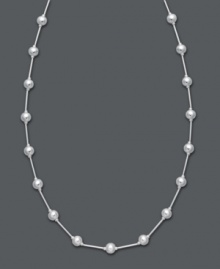 A simple layer that adds polish and shine. Giani Bernini's station necklace features shiny beads strung from a delicate chain. Crafted in sterling silver. Approximate length: 16 inches + 3-inch extender.