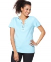 This easy tee from Karen Scott features a little sparkle, thanks to rhinestones at the neckline. Pair it with dark jeans or black trousers for everyday ease.