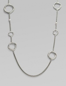 From the Infinity Collection. A signature Yurman box chain of sterling silver is gracefully stationed with cable-and-smooth interlocking rings and sprinkled with tiny white pearls. 5.5mm white cultured freshwater pearls Sterling silver Length, about 44 Toggle closure Imported