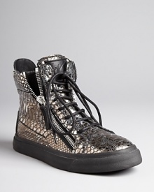 Sneak these Giuseppe Zanotti fashion athletic finds into your shoe rotation and kick up your entire wardrobe. In metallic, snake-embossed leather, they are certain to shake things up.