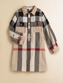 Fun smock styling in her favorite designer check.Pattern varies Spread collar Button placket Button flap chest pockets Side seam pockets Long sleeves with button tab roll cuffs Shirring below back shoulder yoke 97% cotton/2% nylon/1% elastane Machine wash Imported