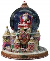 Santa takes center stage in this sugar-coated snow globe from Christopher Radko. A candy cane thrown, peppermint swirls and a cherry on top make it a real holiday treat.