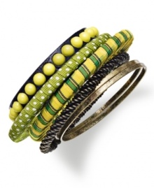 Mix and match with this colorful bangle set from Bar II. With gold tones, green fabric and resin stone accents, you'll add fun and fabulous accessories to your outfit. Crafted in antiqued gold tone mixed metal. Approximate diameter: 2-1/2 inches.