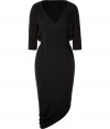 Luxurious dress in fine black cashmere - Tremendously soft and flattering - Modern cut, with a slim, but casually falling top, belted waist, and fashionable 3/4 sleeves - Soft V-neckline - The skirt is slim, knee-length and cut trendy and asymmetrical - Wonderfully sophisticated, yet casual - Wear with gladiator booties, pumps, sandals