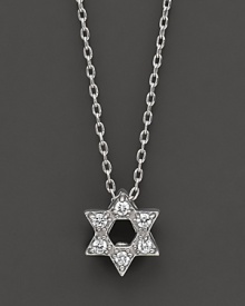 From the Tiny Treasures collection, a Star of David necklace makes a religious statement; with signature ruby accent. Designed by Roberto Coin.