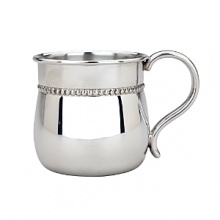 Designed with a beaded border, this baby cup offers classic good looks in non-tarnish bright pewter with a bulged body and softly curved handle. What a wonderful way to honor the new arrival in your life.