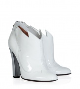 Fashion-forward looks get a futuristic facelift in Laurence Dacades bright white patent leather booties, detailed with a metallic silver heel for that modern-minimalist edge - Rounded toe, decorative topline, stitch detailing, back zip, blocky heel - Pair with contemporary separates and a shimmer of metallic accessories