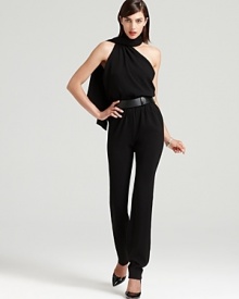 A bold alternative to the standard LBD, this Halston Heritage jumpsuit achieves polished perfect with a fluid silhouette defined by a curve-enhancing belt. A flowing neck sash ups the glamour factor.