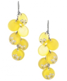 Get an added dose of Vitamin-D! Kenneth Cole New York's punch-bright earrings feature yellow resin circles accented by sparkling crystals. Set in hematite plated mixed metal. Approximate drop: 2-3/8 inches.