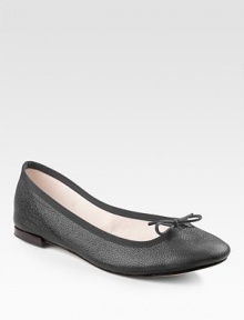 A true ballet style in textured leather with grosgrain trim and classic bow tie. Stacked heel, ½ (15mm) Slight point toe Tie detail Leather sole Made in FranceOUR FIT MODEL RECOMMENDS ordering one half size down as this style runs large. 