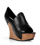 The certifiable must-have shoes of the season, these fashion-forward Camilla Skovgaard wedges are statement-making - Peep-toe, textured leather upper, sculptural wooden heel, side cut out detail - Pair with printed jeans and a blazer or an eye-catching cocktail frock