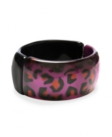 Perfect for prowling. This fierce style by Haskell features an animal print design in purple-colored mixed metal. Hinged design slips easily over the wrist. Approximate length: 8 inches.