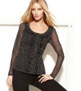 Polka dots, alluringly sheer fabric and feminine ruffles give INC's top a fresh, fashionable look!