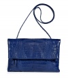 Invest in multi-season sophistication with Nancy Gonzalezs sleek fold-over croco clutch, an ultra luxurious choice in cool royal blue - Fold-over with hidden magnetic snaps and zippered pocket underneath, back slit pocket with magnetic closure, inside zippered back wall pocket, tonal suede lining, removable shoulder strap - Carry as a finish to chic day and evening looks alike