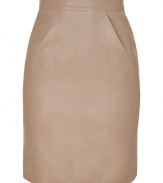 Luxe skirt in ultra-supple, beige leather - A sexy, sophisticated standout from French cult label Jitrois - Classic pencil cut is fitted and feminine, hits above the knee - Elegant dart detail at hips - Higher waist, zips at back - Flattering and polished, a must in any modern wardrobe - Pair with a blouse and blazer by day, or wear with a silk top and sandals by night