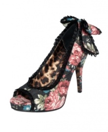 This Cammmie Pump by Betsey Johnson is for the fearless diva in all of us. From the floral denim print and the pleated ribbon detailing outside to the leopard lining on the inside sole and heel, this peep toe is a head turner for sure.