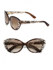 A 50's-inspired cat's-eye frame is accented by a beautiful lace detail. Available in brown with brown gradient lens.Logo temples100% UV protectionMade in Italy