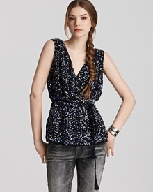 Add sparkle to your night-out look with this sequined V-neck top from French Connection.