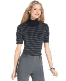 Style&co. adds a feminine twist to this petite houndstooth turtleneck with ruched sleeves.