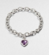 A sweet style with a textured sterling silver link chain and an amethyst heart charm. AmethystSterling silverLength, about 7.5Lobster clasp closureImported 