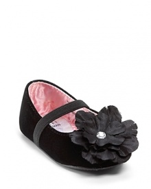 An adorable take on the classic Mary Jane flat, with elastic closure for a secure fit and a rhinestone flower accent at the toe.