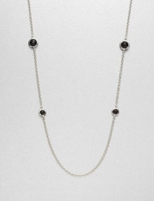 Faceted black onyx stones set in sleek sterling silver on a long link chain. Black onyxSterling silverLength, about 38Lobster clasp closureImported 