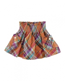 Festive, classic plaid is smocked along the waist and adorned with large patch pockets for an adorable skirt to pair with a favorite top or tee.