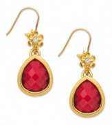 A bouquet beauty. These teardrop earrings from Juicy Couture captivate with floral accents embellished with clear glass stones, sitting atop a faceted ruby-hued glass teardrop. Crafted in 14k gold-plated mixed metal. Approximate drop: 1-1/4 inches.